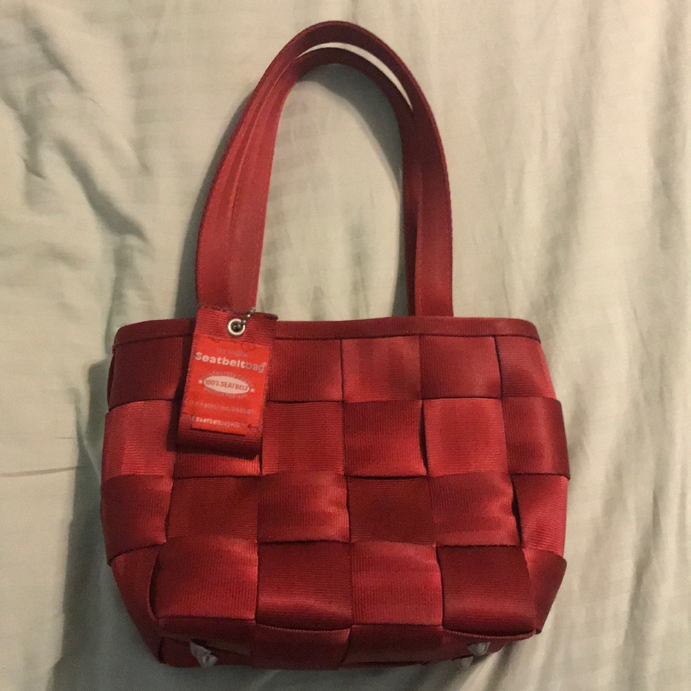 Maroon seat belt bag